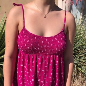 magenta summer romper with white flower detailing
